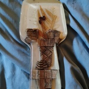 Handcrafted Ceramic Wall Art with Brown and Cream Accents